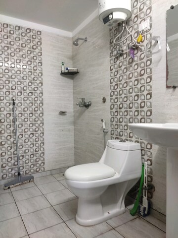 Bathroom in 3.5 BHK Apartment at Gulshan Ikebana, Sector 143 – for Rent