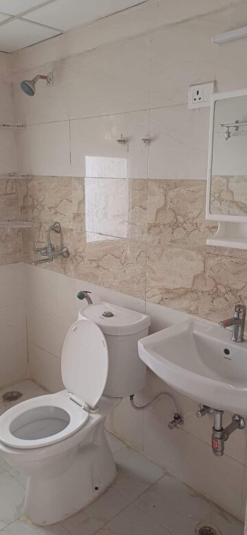 Bathroom in 2 BHK Apartment at Amrapali Golf Homes, Sector 4, Greater Noida – for Sale