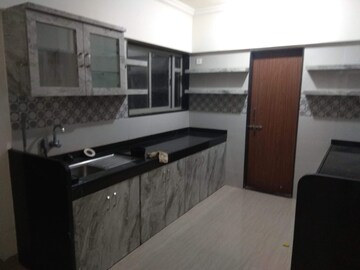 Kitchen in 2 BHK Apartment at Neco Gardens, Viman Nagar – for Sale