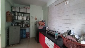 Kitchen in 2 BHK Apartment at Applewood Sorrel, Bopal – for Sale