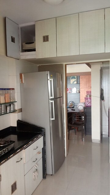 Kitchen in 2 BHK Apartment at Regency Estate, Dombivli East – for Sale