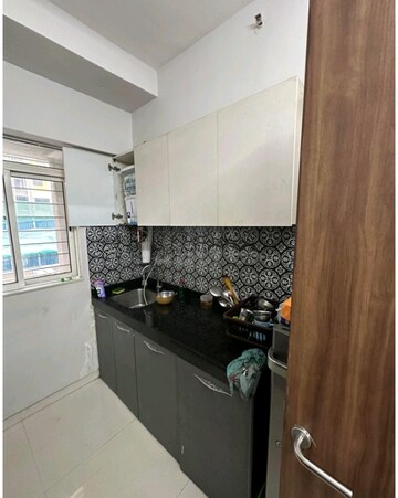 Kitchen in 1 BHK Apartment at Lodha Amara, Kolshet Road – for Sale