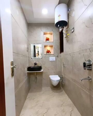 Bathroom in 3 BHK Builder Floor at Mahavir Enclave – for Sale
