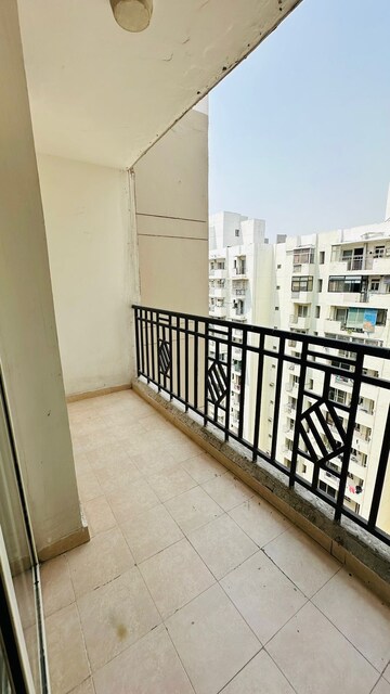 Balcony in 2 BHK Apartment at Aims Golf City, Sector 75 – for Sale