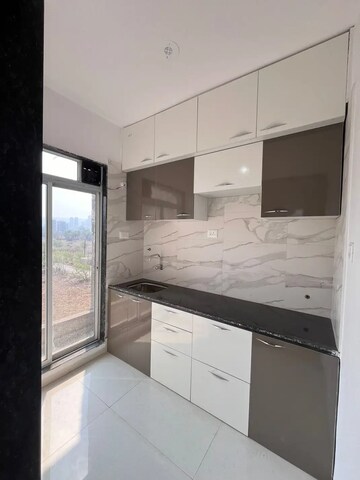Kitchen in 1 BHK Apartment at Mahavir Kanti Avenue, Nalasopara East – for Sale