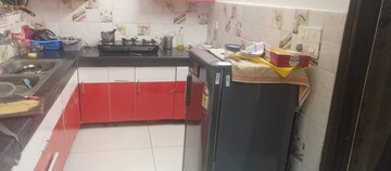 Kitchen in 2 BHK Apartment at Dhakoli Village – for Sale