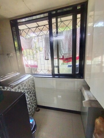 Kitchen in 1.5 BHK Apartment at Shree Krishna Niwas CHS, Powai – for Sale