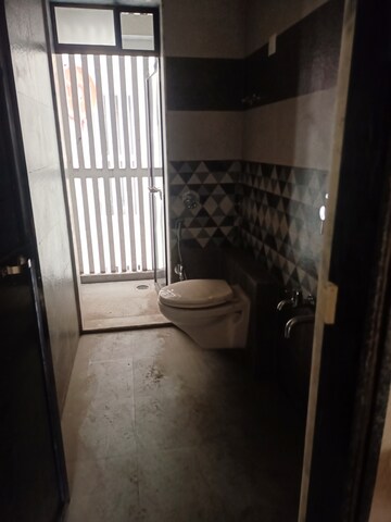 Bathroom in 2 BHK Apartment at Naupada – for Sale