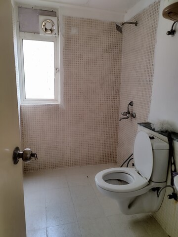 Bathroom in 3 BHK Apartment at Jaypee Greens Kosmos, Sector 134 – for Sale