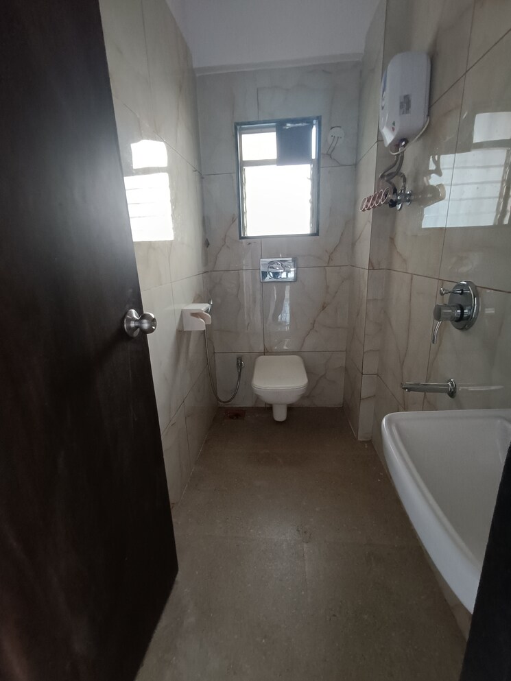 Bathroom, rna-ng-hill-crest 2 Bedroom 556 Sq.Ft. Apartment In Mira Road Thane 7629341