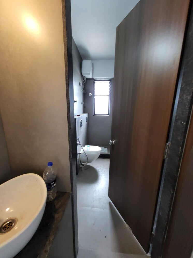 Bathroom, royal-arcade-apartment 2 Bedroom 1006 Sq.Ft. Apartment In Dhankawadi Pune 7629833