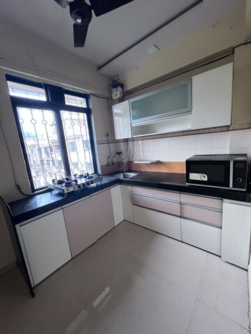 Kitchen in 1 BHK Apartment at Lodha Paradise, Majiwada – for Sale