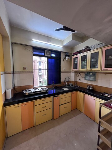 Kitchen in 1 BHK Apartment at Lodha Paradise, Majiwada – for Sale