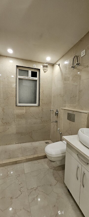 Bathroom in 4 BHK Builder Floor at Ansal API Versalia, Sector 67a – for Sale