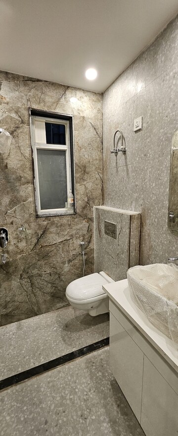 Bathroom in 4 BHK Builder Floor at Ansal API Versalia, Sector 67a – for Sale