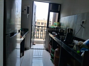 Kitchen in 1.5 BHK Apartment at Runwal Gardens, Dombivli East – for Sale