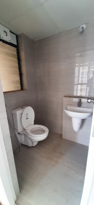 Bathroom in 1.5 BHK Apartment at Runwal Gardens, Dombivli East – for Sale