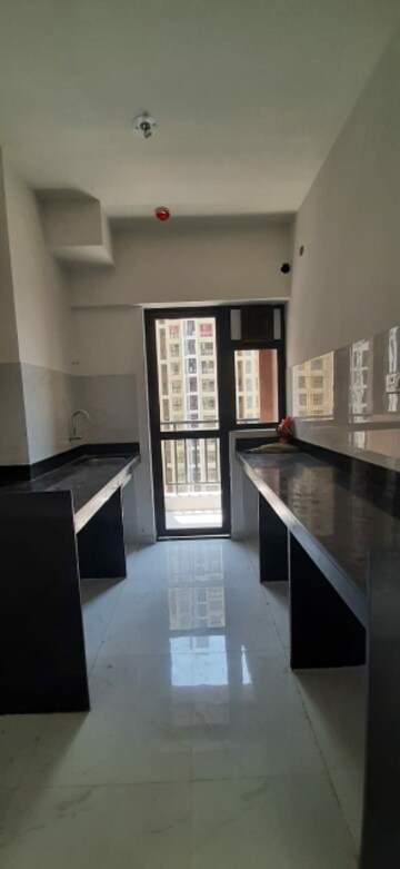 Kitchen in 1.5 BHK Apartment at Runwal Gardens, Dombivli East – for Sale