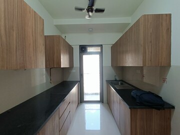 Kitchen in 1 BHK Apartment at Kishor Sukur Enclave A, Ghodbunder Road – for Sale