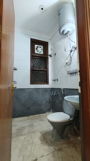 Bathroom in 3 BHK Apartment at C Dot Co operative Group Housing Society, Sector 56 – for Sale