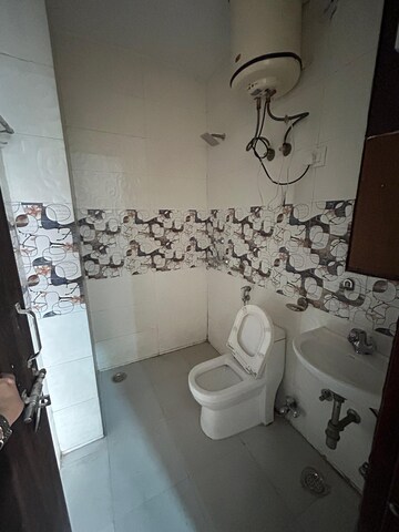 Bathroom in 3 BHK Apartment at C Dot Co operative Group Housing Society, Sector 56 – for Sale