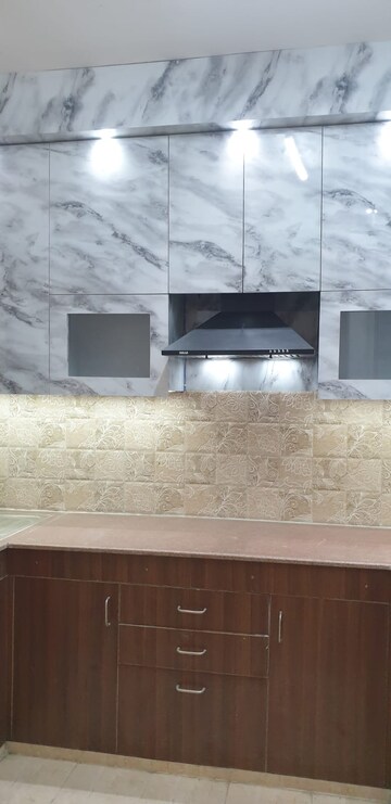 Kitchen in 3 BHK Apartment at JKG Palm Court, Sector 16c Greater Noida – for Sale