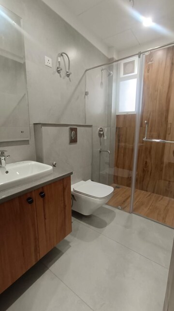 Bathroom in 4 BHK Apartment at Dhakoli Village – for Sale