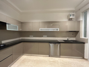 Kitchen in 3 BHK Apartment at Maya Green Lotus Utsav, International Airport Road – for Sale