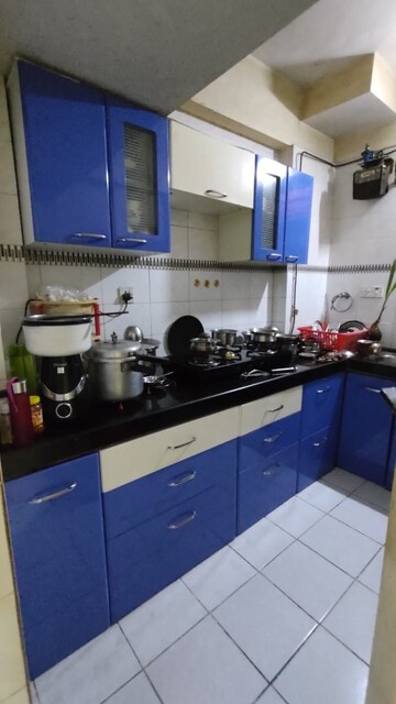 Kitchen in 1 BHK Apartment at Ghodbunder Road – for Sale