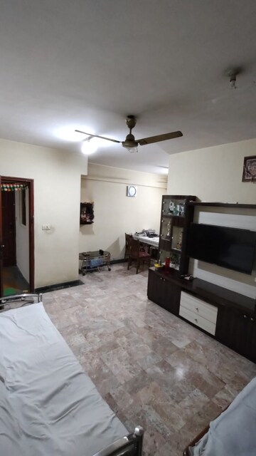 Living Room in 1 BHK Apartment at Ghodbunder Road – for Sale