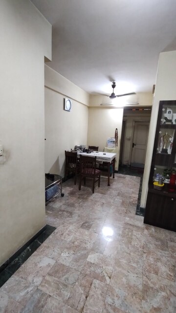 Living Room in 1 BHK Apartment at Ghodbunder Road – for Sale