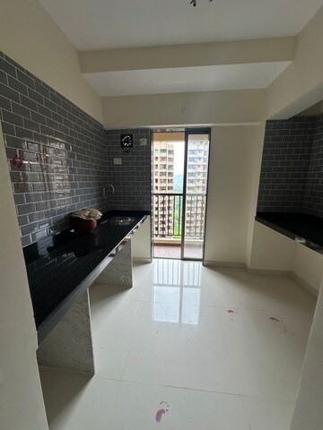 Kitchen in 1 BHK Apartment at Murbad Road – for Sale