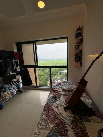 Living Room in 2 BHK Apartment at Lodha Splendora, Ghodbunder Road – for Sale