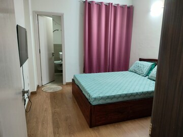 Bedroom in 3.5 BHK Apartment at Emaar Palm Gardens, Sector 83 – for Sale