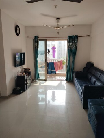 Living Room in 1.5 BHK Apartment at Lodha Palava City, Dombivli East – for Sale