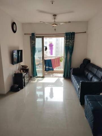 Living Room in 1.5 BHK Apartment at Lodha Palava City, Dombivli East – for Sale