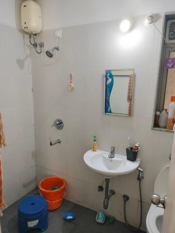 Bathroom in 1.5 BHK Apartment at Lodha Palava City, Dombivli East – for Sale