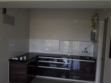 Kitchen in 1 BHK Apartment at Brahma Waterbay, Pune East – for Sale