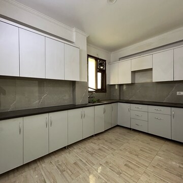 Kitchen in 3 BHK Apartment at Paryavaran Complex – for Sale