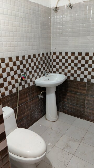 Bathroom in 2.5 BHK Apartment at Dhakoli Village – for Sale