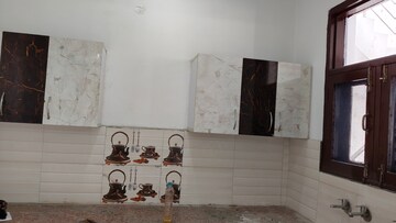 Kitchen in 2.5 BHK Apartment at Dhakoli Village – for Sale