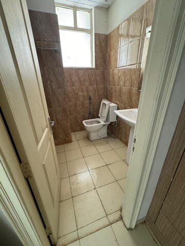 Bathroom in 3 BHK Apartment at Sushma Elite Cross, Dhakoli Village – for Sale