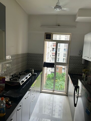 Kitchen in 1 BHK Apartment at Hiranandani Estate, Ghodbunder Road – for Sale