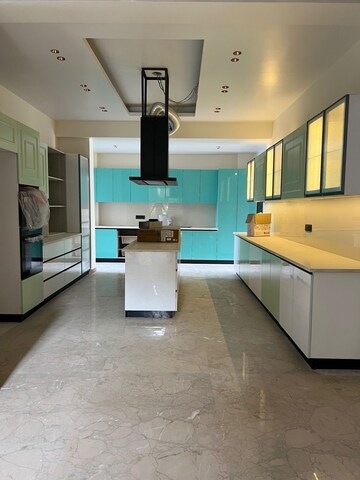 Kitchen in 4 BHK Builder Floor at Auram Floor, South City 2 – for Sale