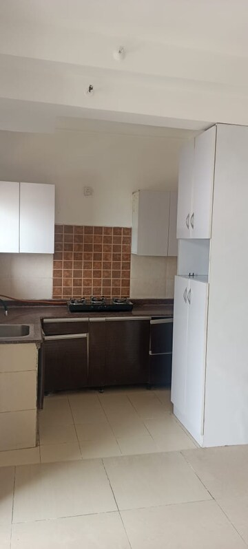 Kitchen in 2.5 BHK Apartment at Gaur City 2 - 12th Avenue, Sector 16c Greater Noida – for Sale