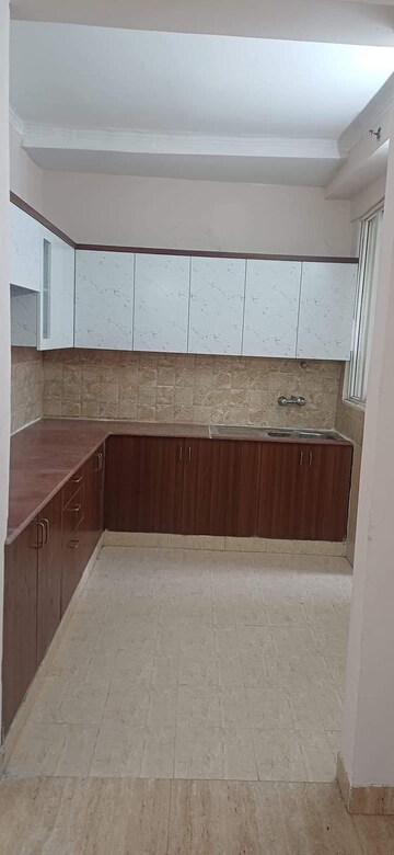 Kitchen in 2 BHK Apartment at Amrapali Golf Homes, Sector 4, Greater Noida – for Sale