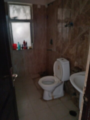 Bathroom in 2.5 BHK Apartment at Nimbus Express Park View, Chi V Greater Noida – for Sale