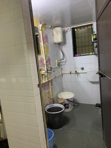 Bathroom in Studio Apartment at Om Trimurti CHS Dombivli, Dombivli West – for Sale