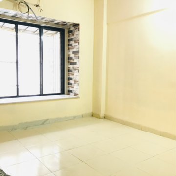 Master Bedroom in 2 BHK Apartment at Veda CHS, Dahisar West – for Sale