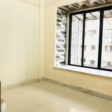Bedroom in 2 BHK Apartment at Veda CHS, Dahisar West – for Sale